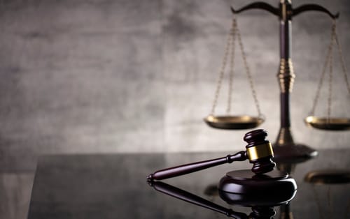 Private investigator in Las Vegas conducting a witness interview for a criminal defense case